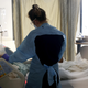 Nurse Elisa Gilbert checks on a patient in the acute care covid-19 unit at the Harborview Medical Center on January 21, 2022 in Seattle, Washington.